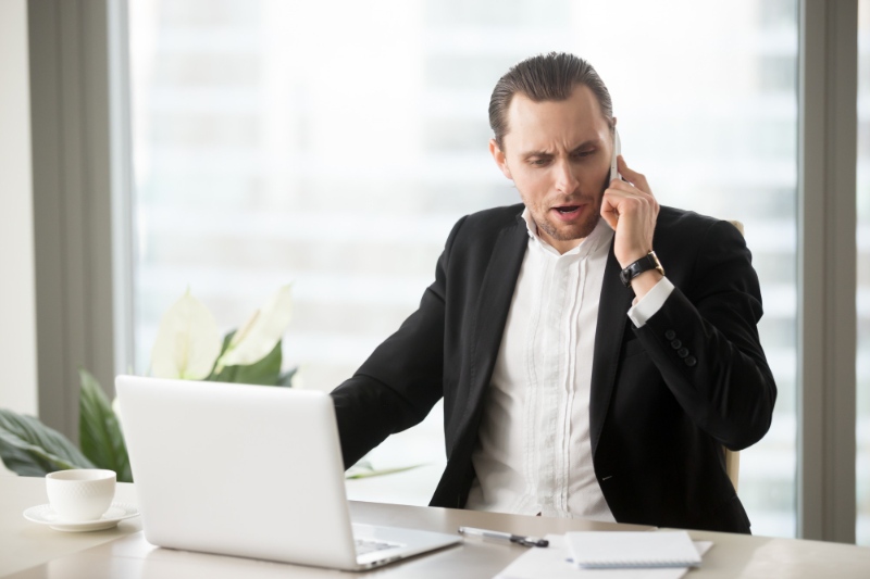 a business man talking on the phone