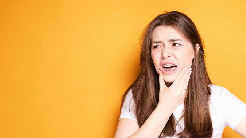Why Braces Hurt and How to Treat Braces Pain?