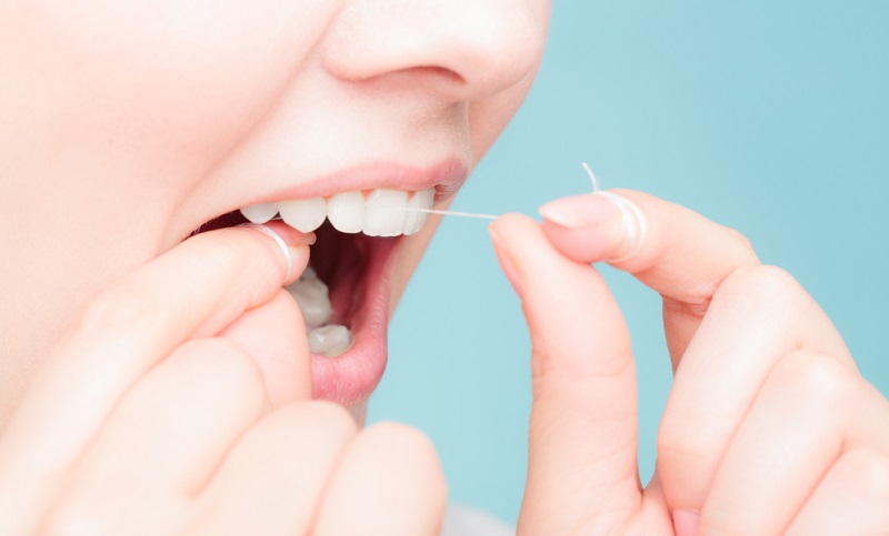 dental floss types benefits uses