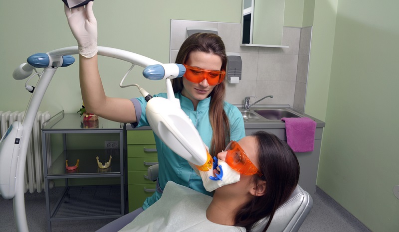 Laser Teeth Whitening: Benefits, Cost, Side Effects & More