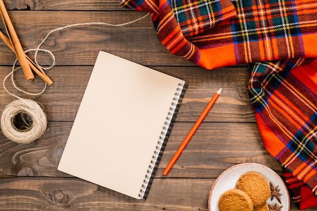 Flatlay autumn composition. Women fashion red scarf, paper notepad with empty page, pen, cookies