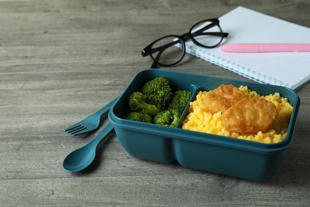 Workplace with lunch box on gray textured table