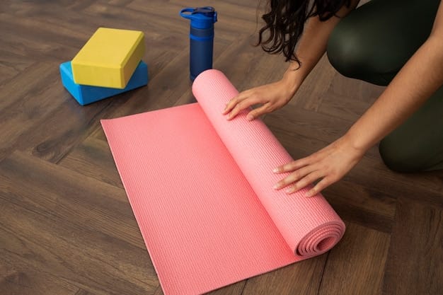 Young woman with yoga essentials