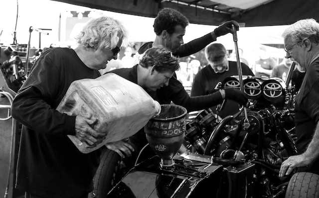 What training programs are essential for automotive mechanics' success?