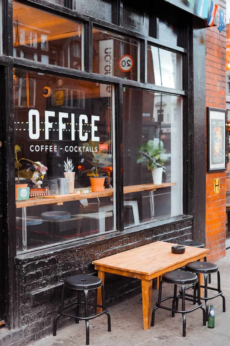 How can cafe owners successfully expand their business regionally?