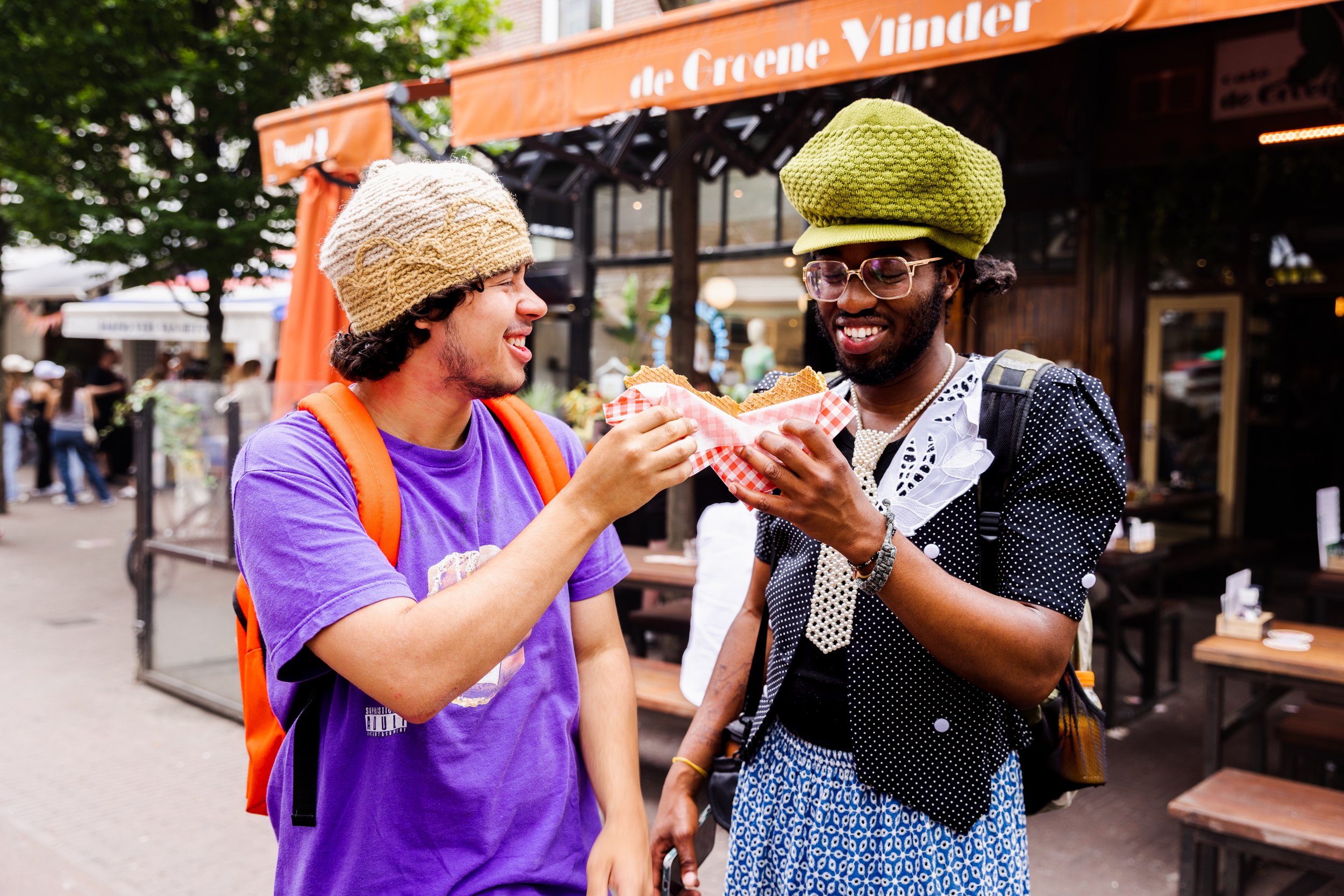amsterdam food festival, two guys eating dutch food