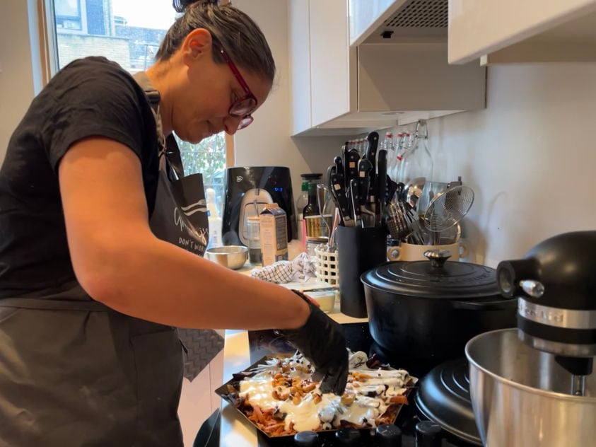 Host Ghena in London, cooking with locals
