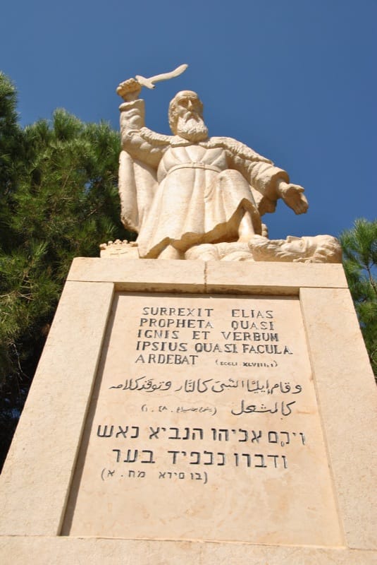 Elijah, wielding sword and satire for God.