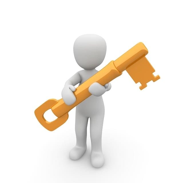 a man holding a key