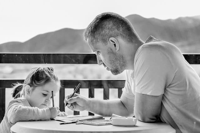 father teaching his kid