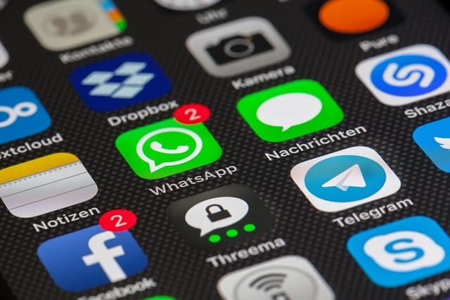 phone screen showing features like communication phone, networking, app, cha mobile, networked, global, iphone, ios, make a phone call, community, social media, multimedia, web, instant messenger, touch screen, threema, imessage, telegram, social network