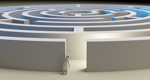 man trying to solve the maze