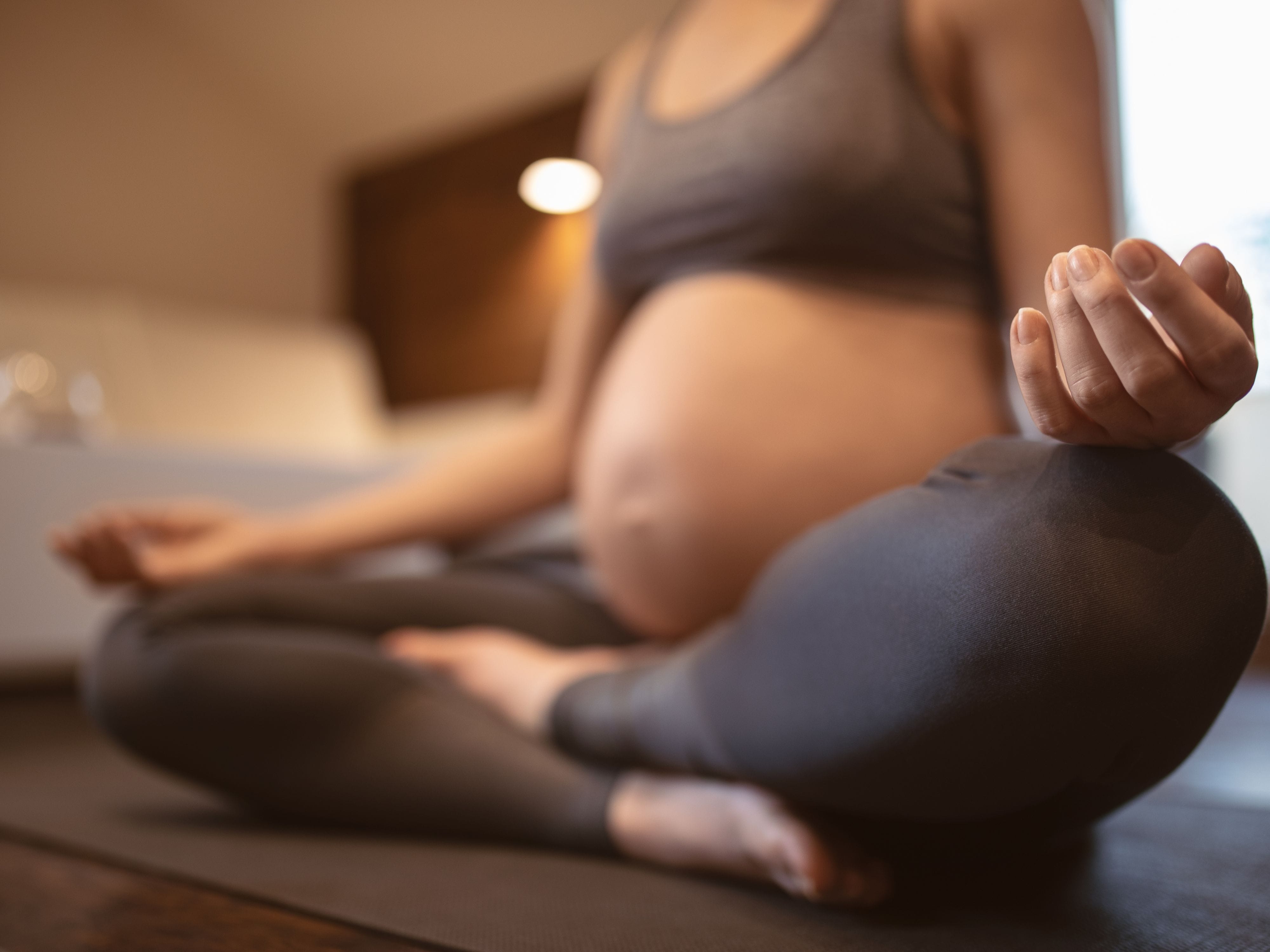 Pregnant lady practicing pranayama yoga – prenatal yoga