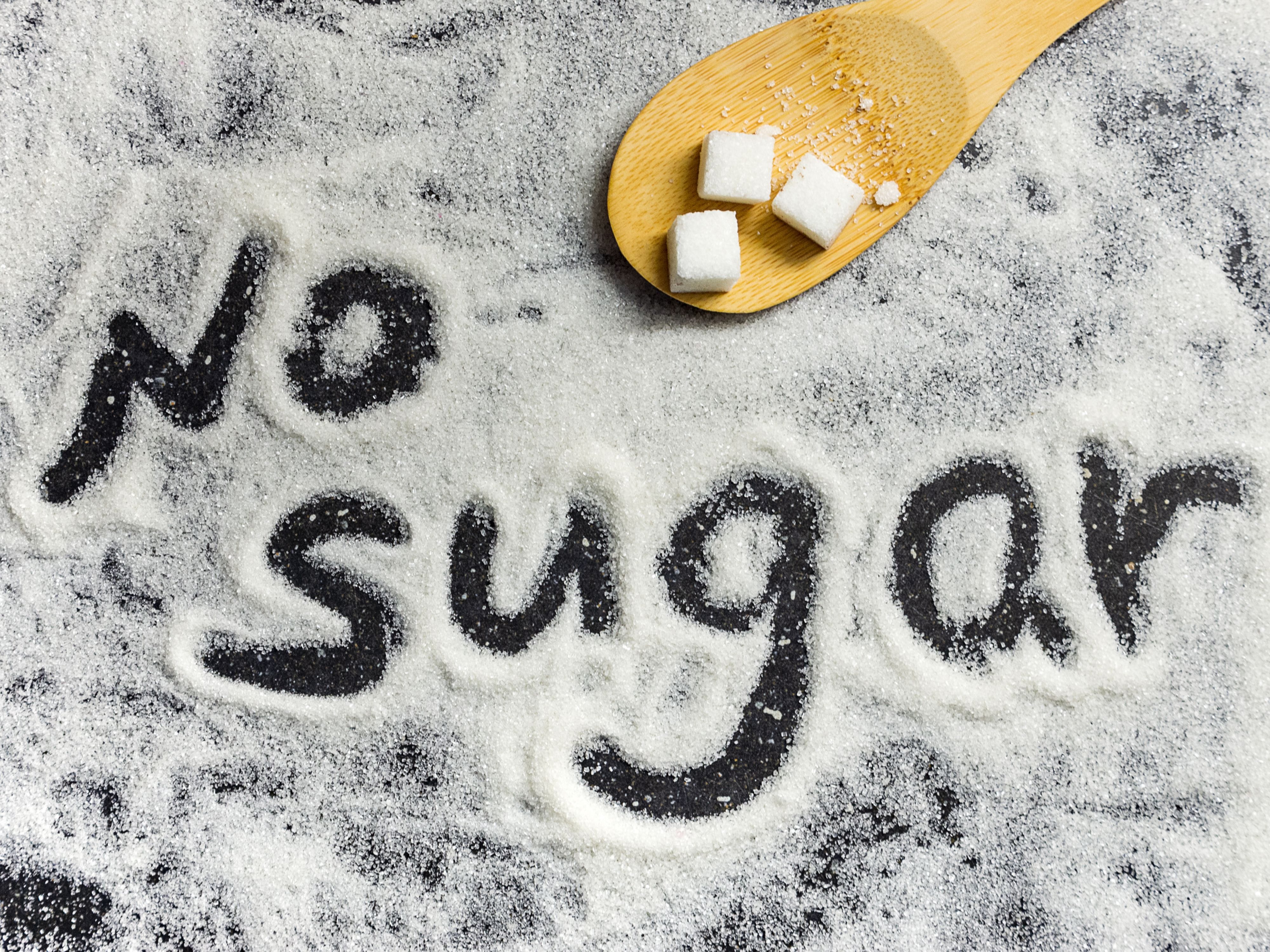 No Sugar written on a pile of sugar