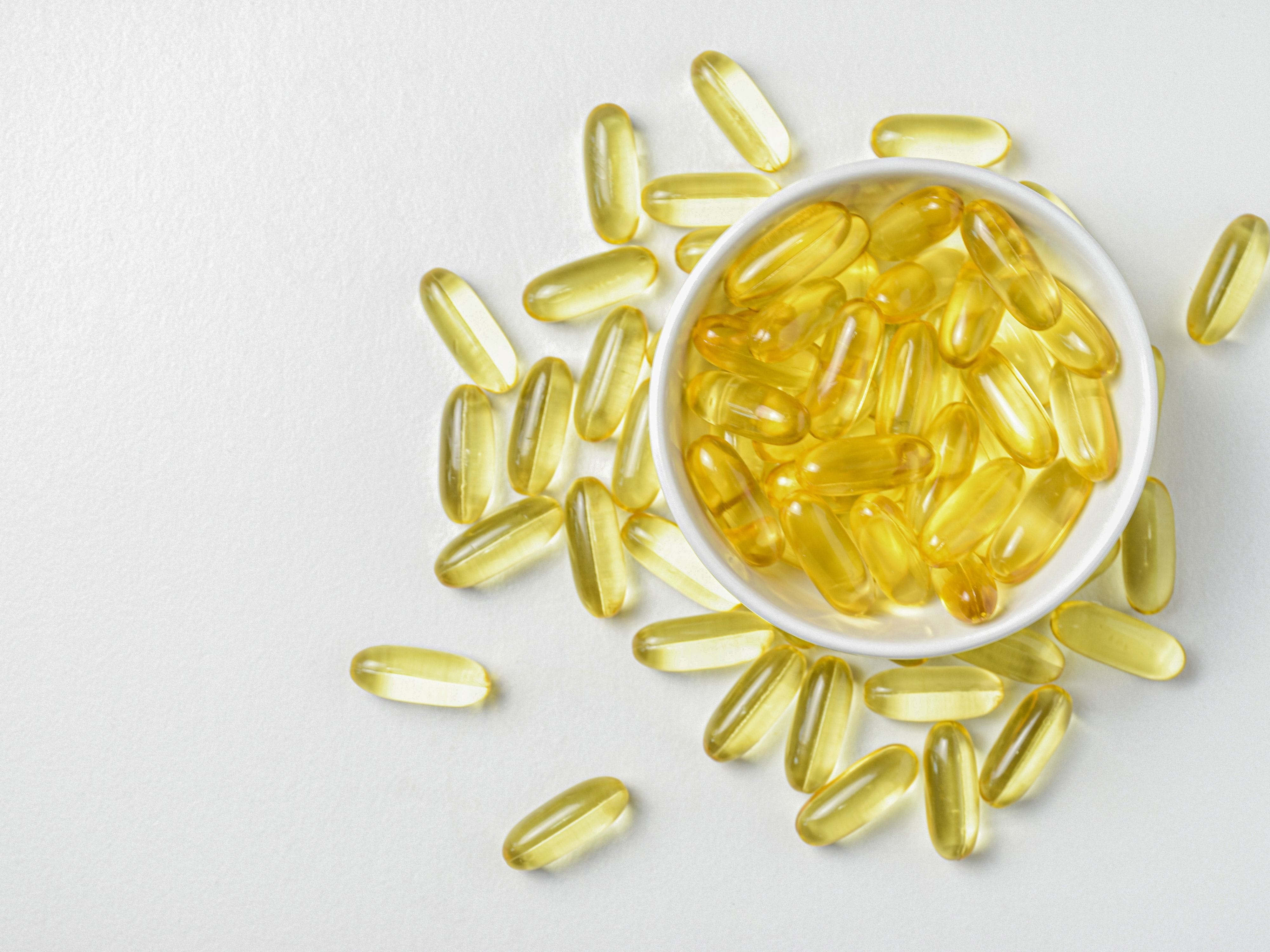 Bowl of Vitamin D supplements as a backup to natural foods