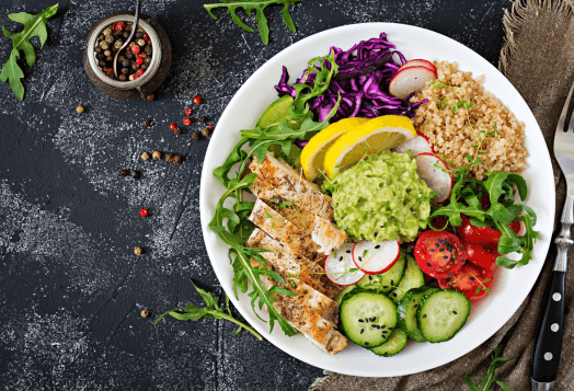 Healthy salad bowl with fresh veggies and fruits