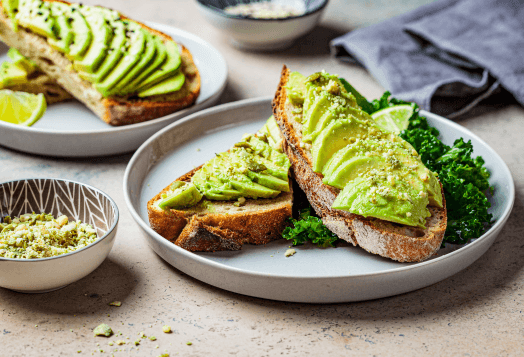 Avocado toast beautifully served on a plate.