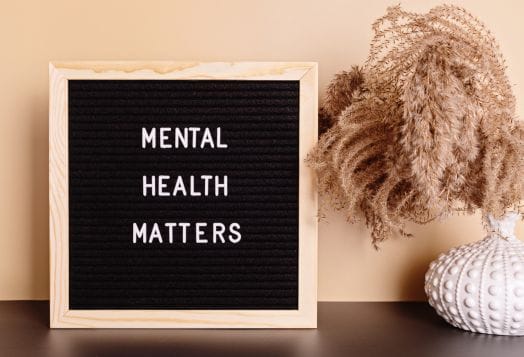 A blackboard with "Mental Health Matters" written on it