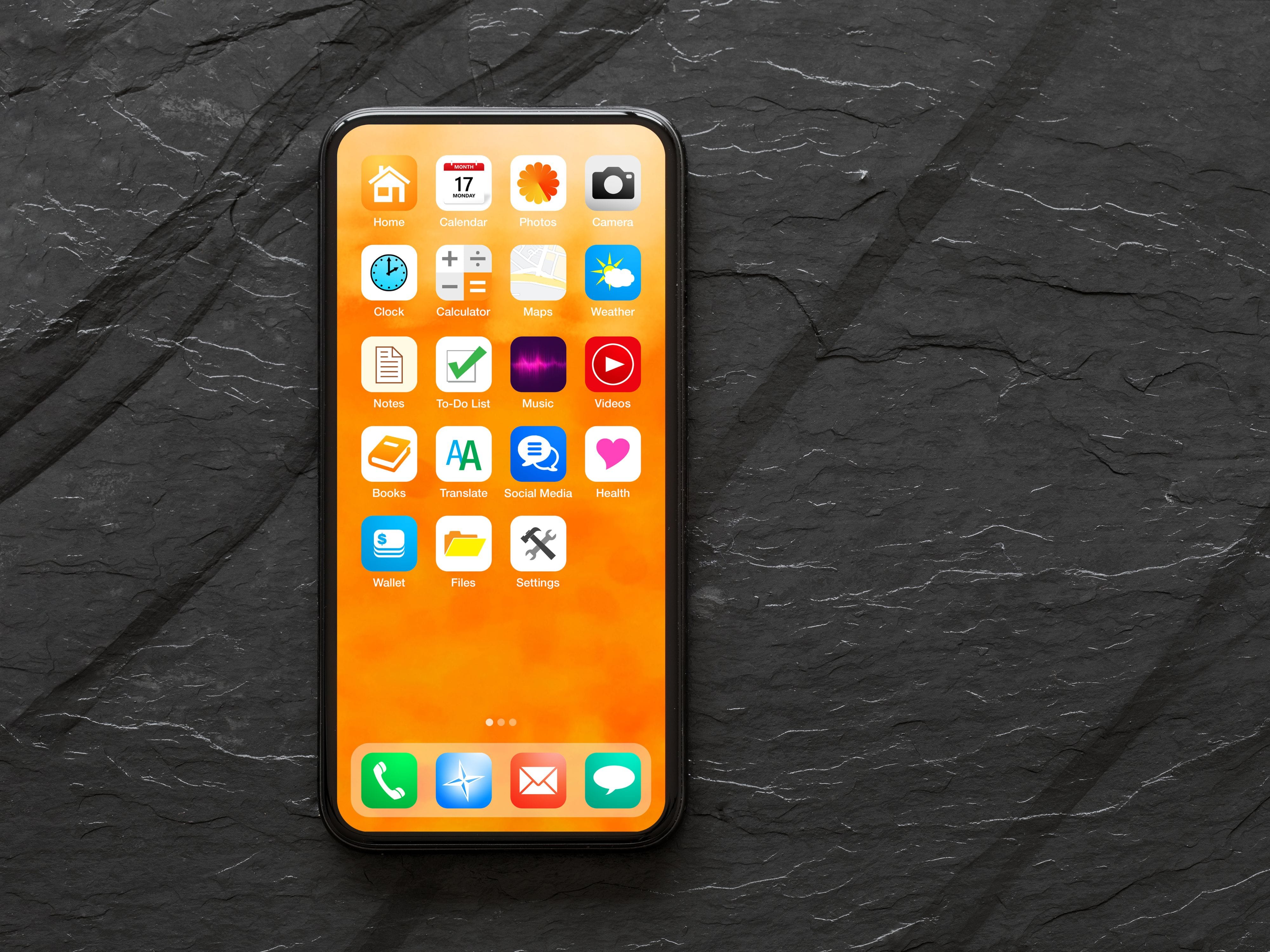 Phone lying on a dark, stony background