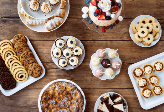 An assortment of desserts elegantly arranged on a table