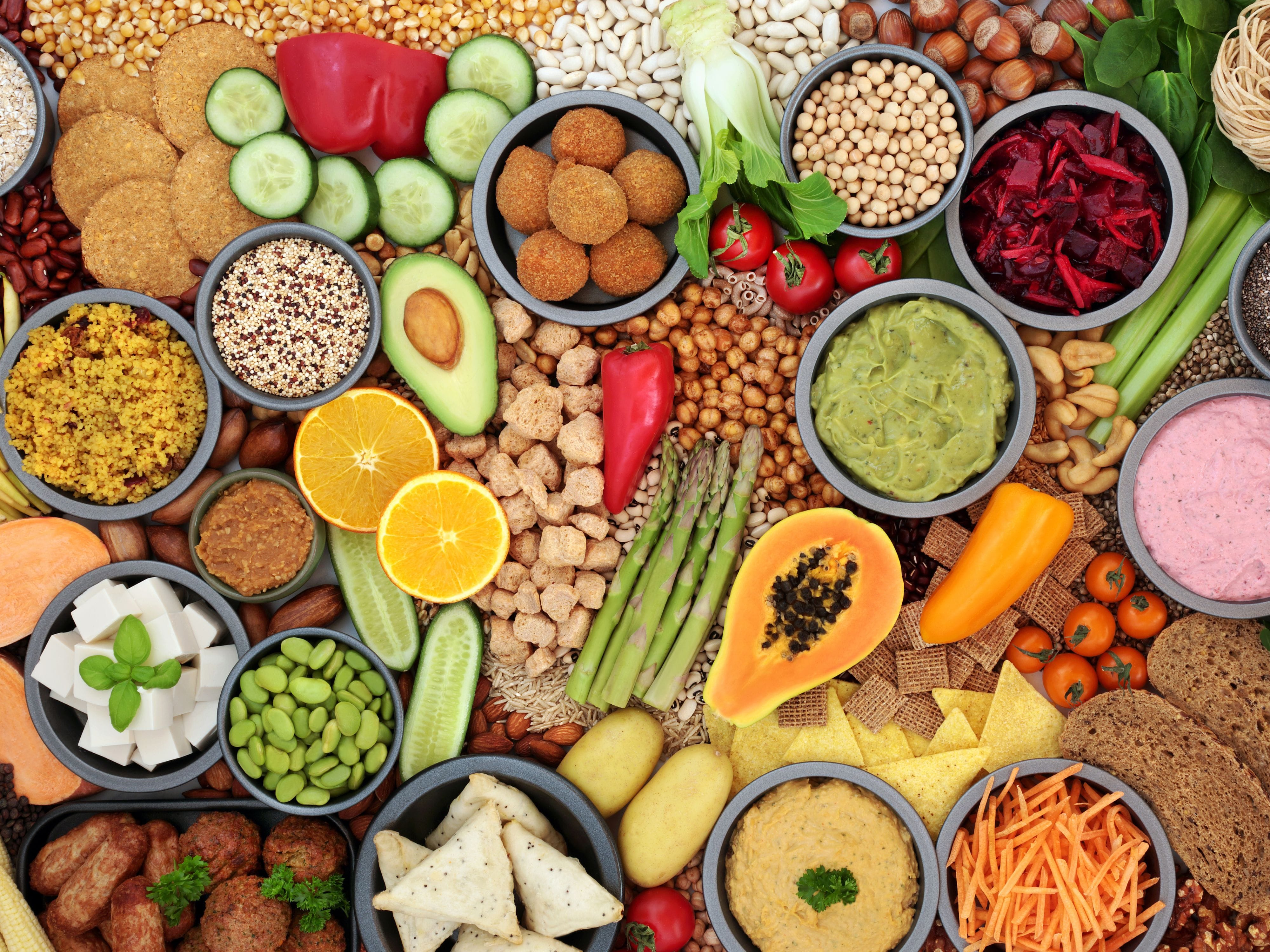 Diverse bowls of colorful vegan food