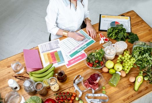 Nutritionist's table with healthy food