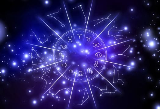 Zodiac wheel with constellations and stardust