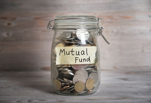 Jar labeled "Mutual Fund" filled with coins