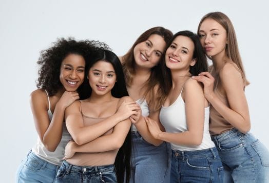 Group of happy and diverse young women