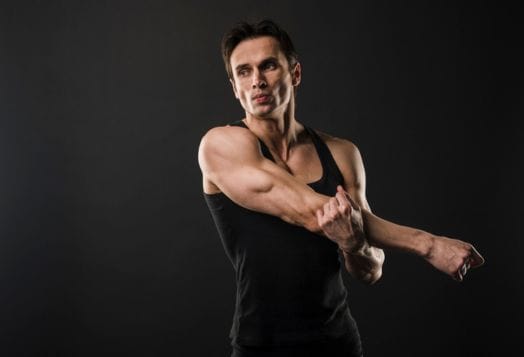 Man stretching his triceps
