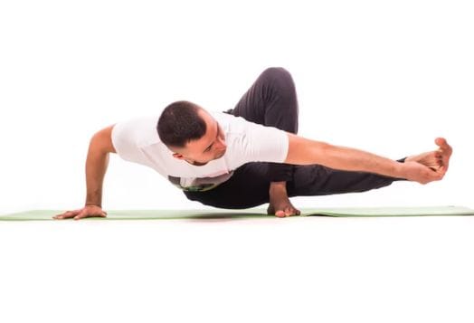 Yogi in Eka Pada Koundinyasana II