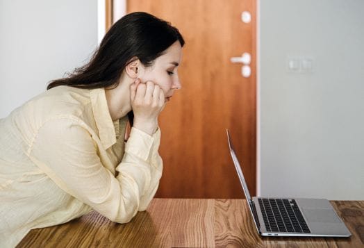 Woman looking at a laptop