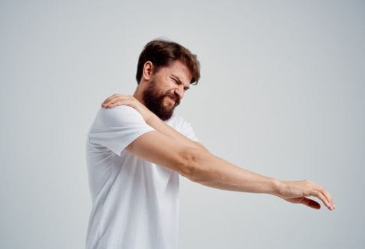 Man experiencing shoulder pain