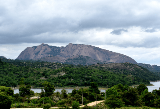 Ramanagara, "The Sholay Hills Adventure," featuring rocky hills and a lake