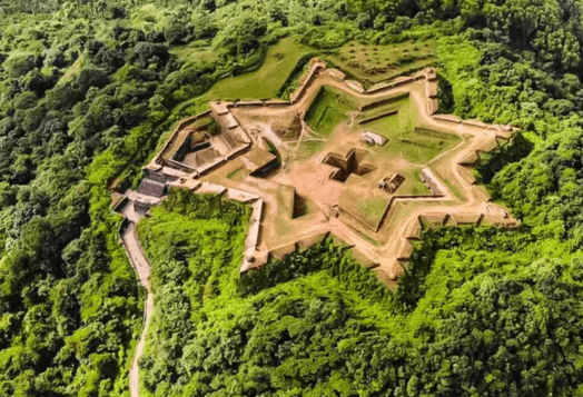 Star-shaped fort amidst dense green forest, Sakleshpur