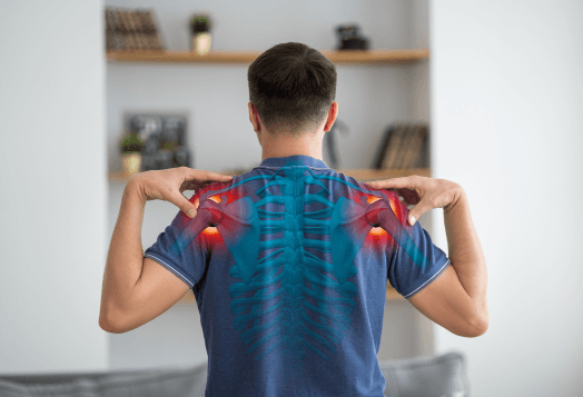 Man with graphic overlay showing shoulder pain performing shoulder rolls