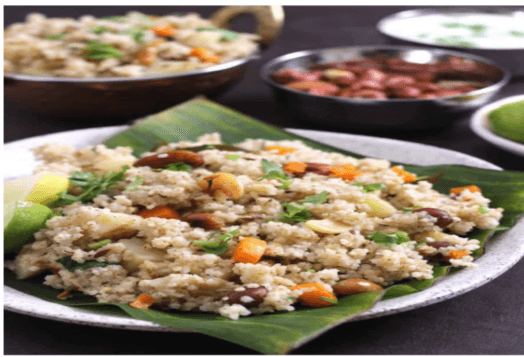 A plate of Samak Rice Pulao, with peanuts and carrots