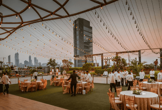 A city rooftop with a catered event setup