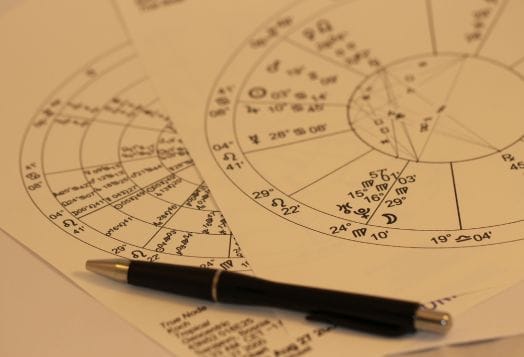 Astrology charts with a pen