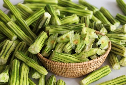 Chopped drumstick vegetables in a basket