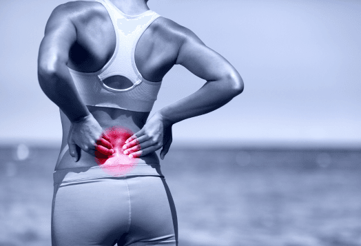 Woman experiencing lower back pain