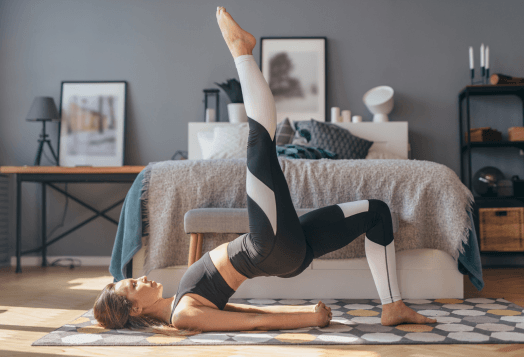 Woman doing a single-leg glute bridge