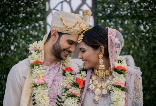 Indian bride and groom in wedding attire