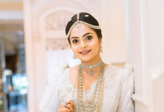 South Asian bride in white wedding sari