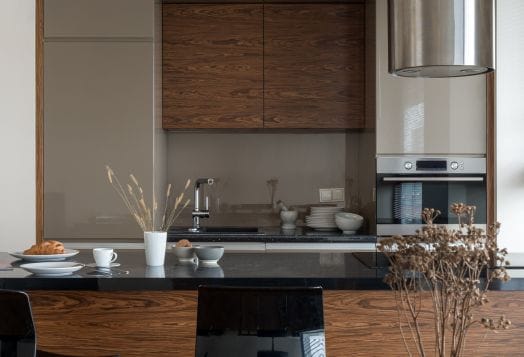 Modern kitchen with wood and gray cabinets