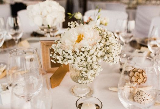 White floral centerpiece on wedding table