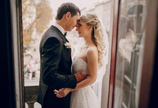 Bride and groom in soft natural wedding lighting