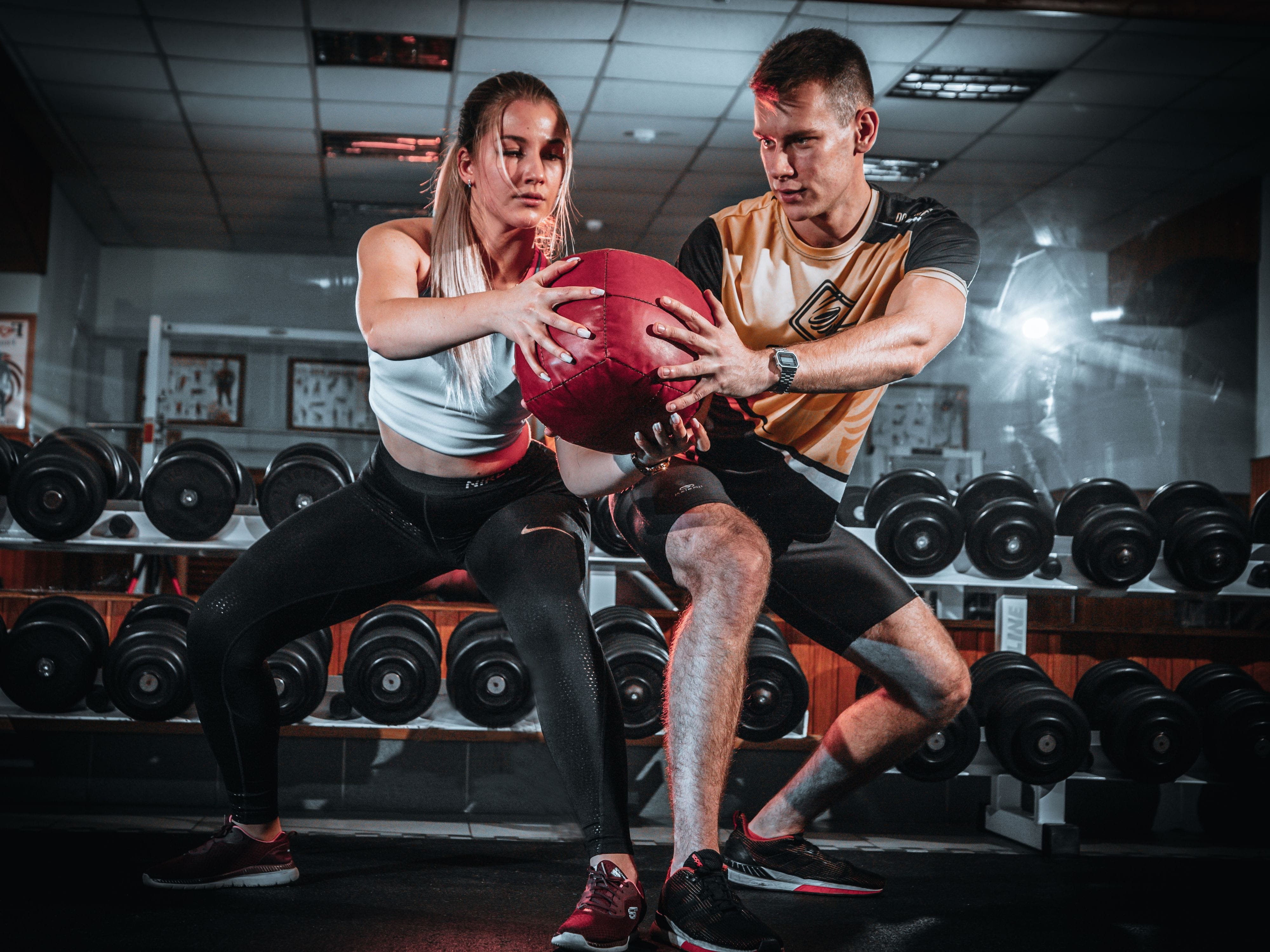 Couple working out with medicine ball