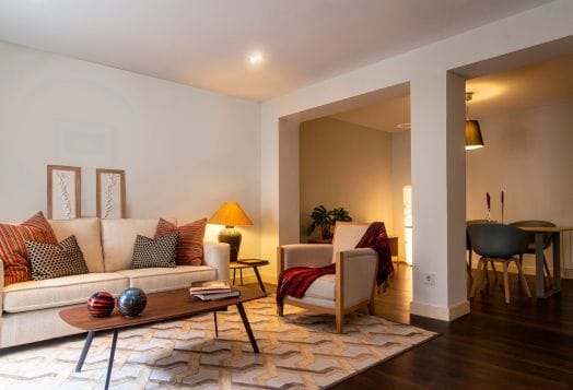 Modern living room with dining area view