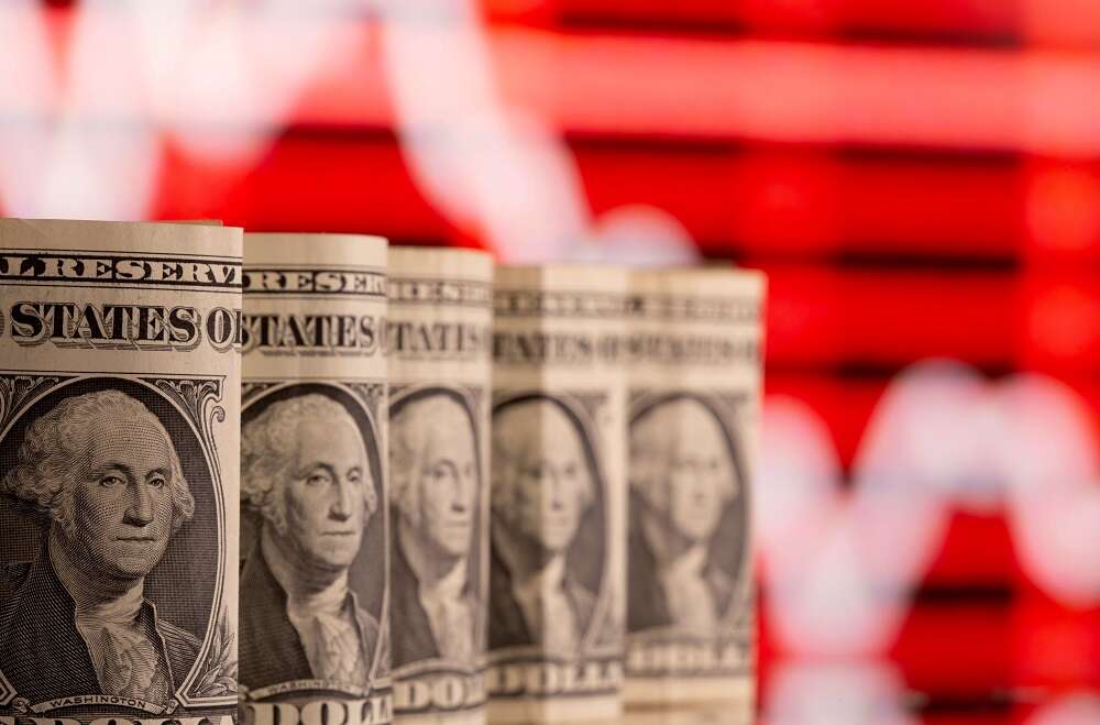 Risk FX retreat catapults dollar to 3-month top as reflation doubts reemerge